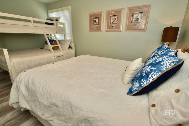 bedroom featuring dark hardwood / wood-style floors