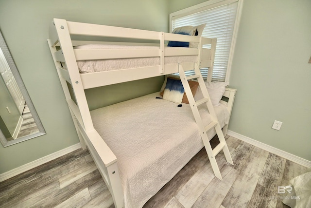 bedroom with light hardwood / wood-style flooring