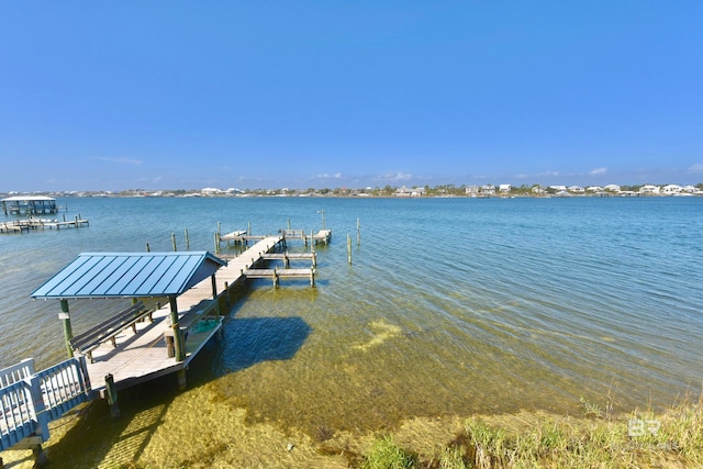 dock area with a water view