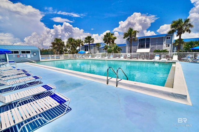 view of pool featuring a patio