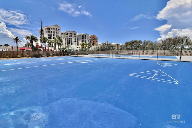 view of nearby features featuring tennis court