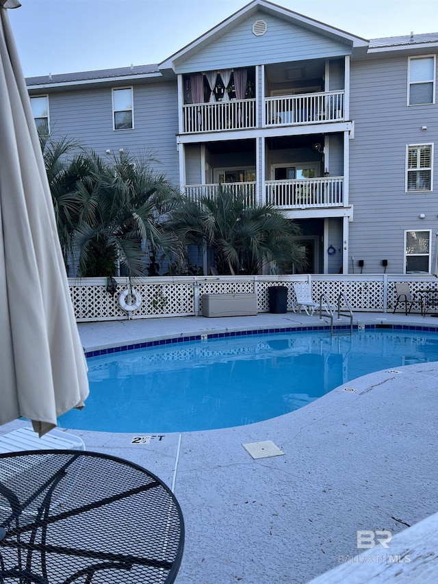 view of pool featuring a fenced in pool