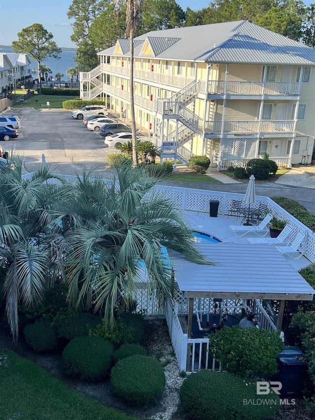 exterior space featuring uncovered parking