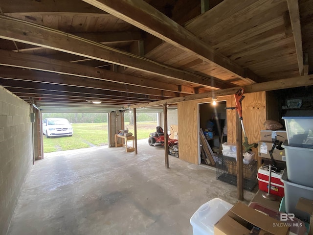 garage featuring concrete block wall