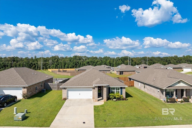 view of front facade featuring a garage and a front lawn