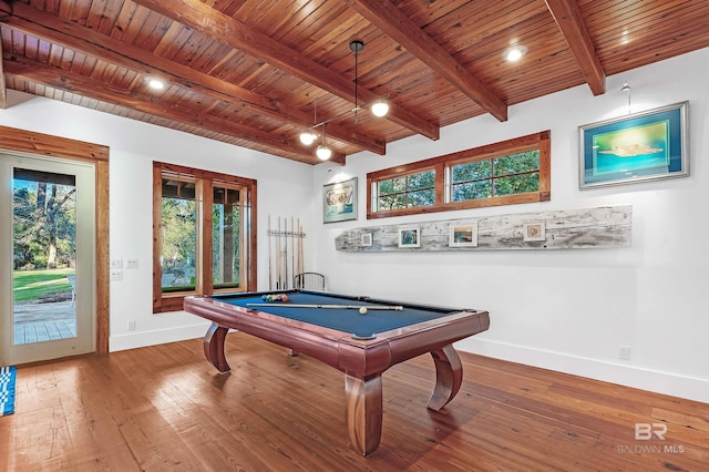 game room with beam ceiling, wood-type flooring, wooden ceiling, and baseboards