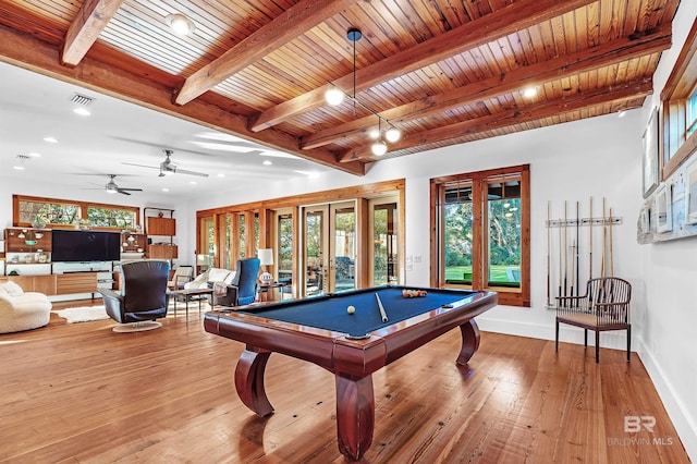 recreation room featuring french doors, beamed ceiling, and wood-type flooring