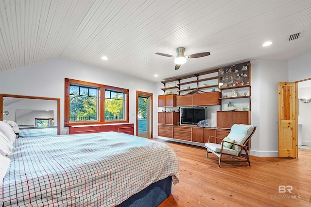 bedroom featuring vaulted ceiling, light wood finished floors, visible vents, and recessed lighting