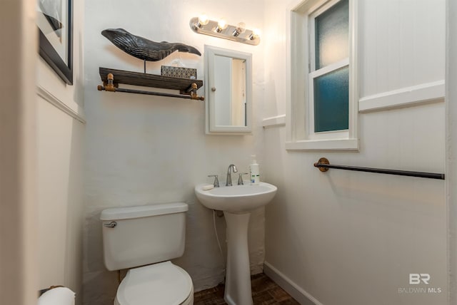 bathroom featuring toilet