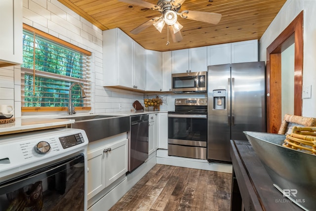 kitchen featuring stainless steel appliances, white cabinets, dark hardwood / wood-style floors, wooden ceiling, and ceiling fan