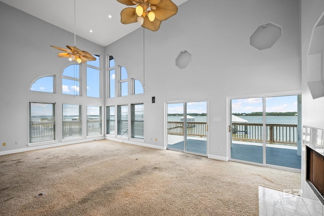 2024 W Beach Blvd, Gulf Shores, AL 36542 - unfurnished sunroom with a water view and vaulted ceiling