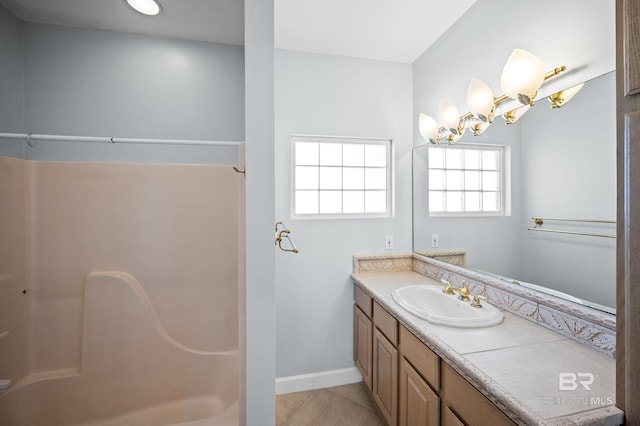 2024 W Beach Blvd, Gulf Shores, AL 36542 - full bathroom featuring vanity, a shower, tile patterned floors, and a chandelier