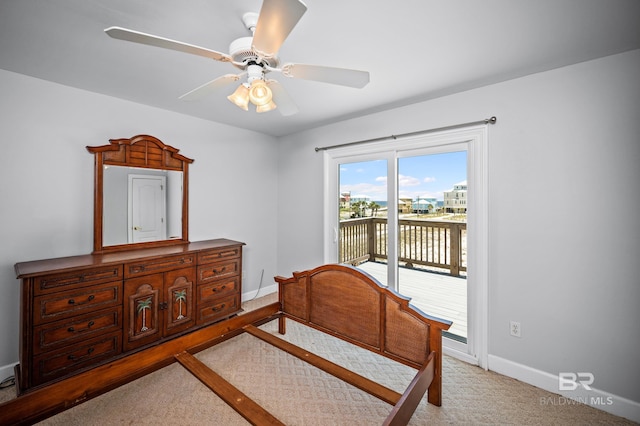 2024 W Beach Blvd, Gulf Shores, AL 36542 - bedroom with access to outside, carpet floors, and a ceiling fan