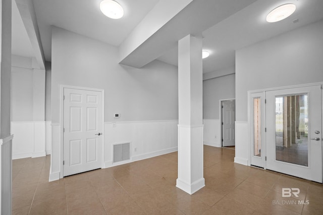 2024 W Beach Blvd, Gulf Shores, AL 36542 - below grade area featuring tile patterned floors and wainscoting