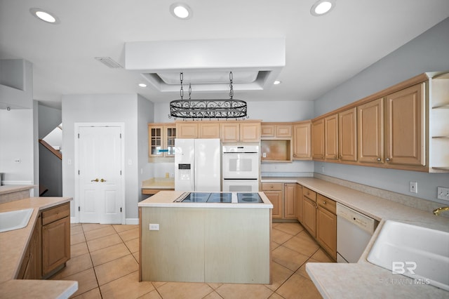 2024 W Beach Blvd, Gulf Shores, AL 36542 - kitchen with white appliances, a tray ceiling, open shelves, light tile patterned flooring, and recessed lighting