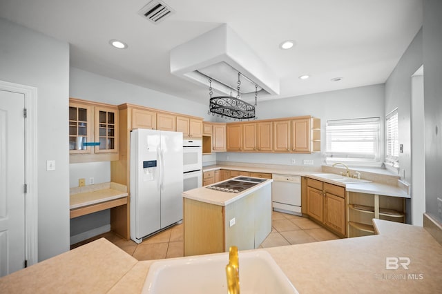 2024 W Beach Blvd, Gulf Shores, AL 36542 - kitchen featuring white appliances, light brown cabinetry, a center island, light tile patterned floors, and recessed lighting
