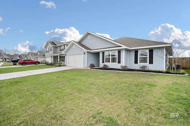 single story home with fence, cooling unit, concrete driveway, and a front yard