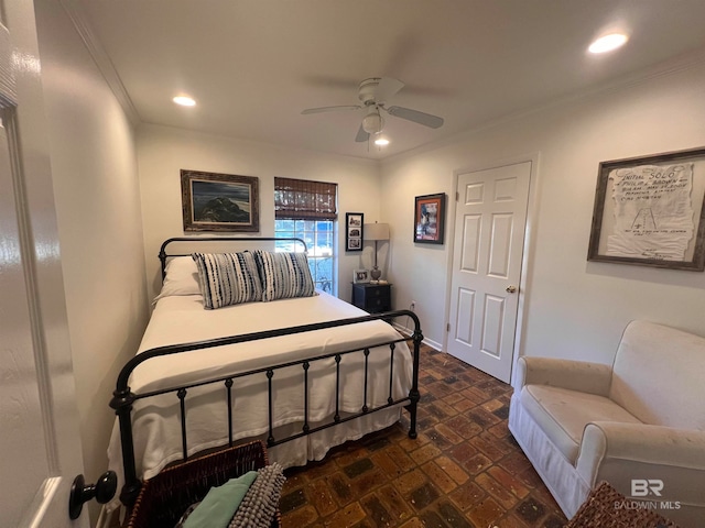 bedroom featuring ceiling fan and ornamental molding