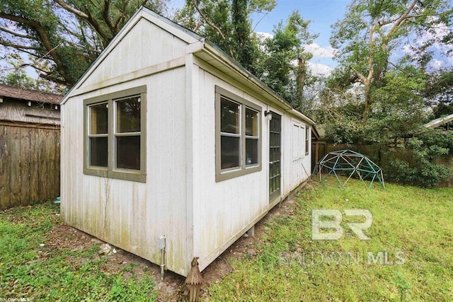 56 Deferriet Ct, Fairhope, AL 36532 - view of outbuilding with a fenced backyard