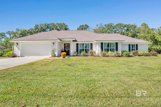 ranch-style home with a front yard and a garage