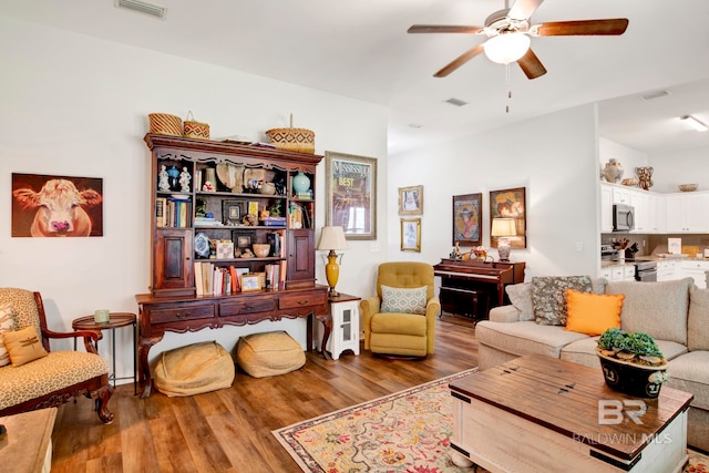 interior space featuring ceiling fan and hardwood / wood-style flooring