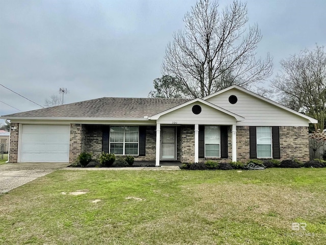 ranch-style home with a garage and a front lawn