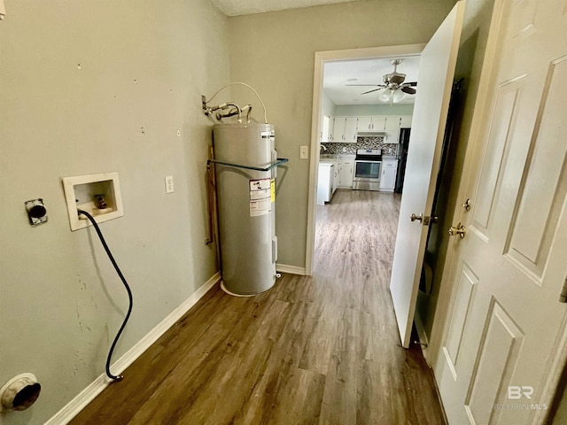 utility room with water heater