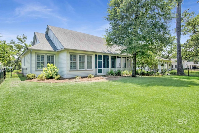 ranch-style home with a front lawn