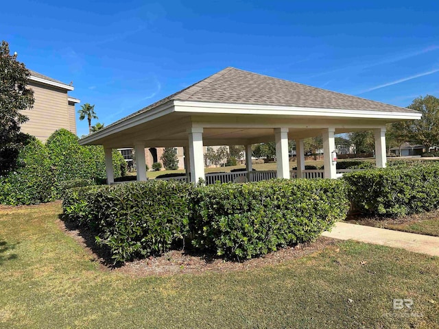 view of property's community with a gazebo and a lawn