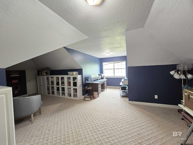 bonus room with carpet flooring, a textured ceiling, and lofted ceiling