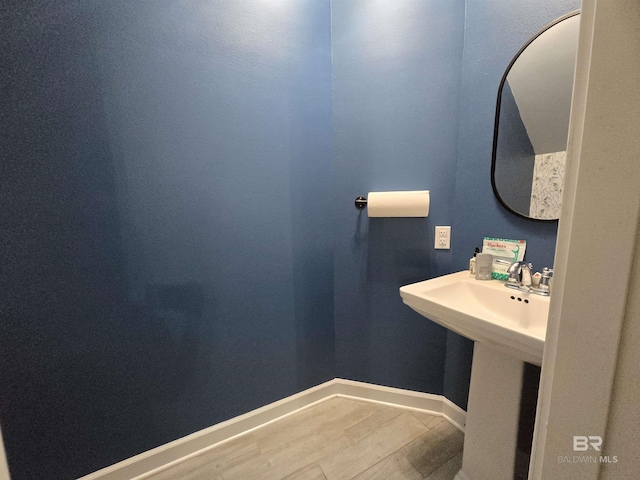 bathroom featuring baseboards