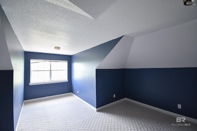 11151 Colvin Ln, Daphne, AL 36526 - bonus room featuring a textured ceiling, carpet, and baseboards