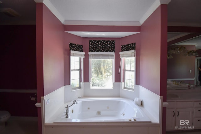 11151 Colvin Ln, Daphne, AL 36526 - full bath featuring vanity, a whirlpool tub, toilet, and crown molding