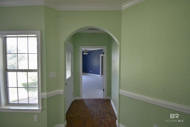 11151 Colvin Ln, Daphne, AL 36526 - hallway with arched walkways, brick floors, plenty of natural light, baseboards, and ornamental molding