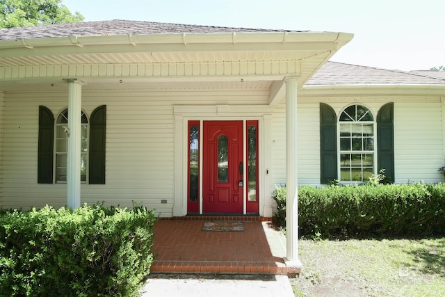 11151 Colvin Ln, Daphne, AL 36526 - view of exterior entry featuring a shingled roof and covered porch