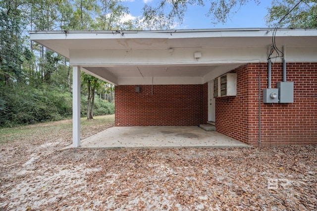 view of vehicle parking with a carport