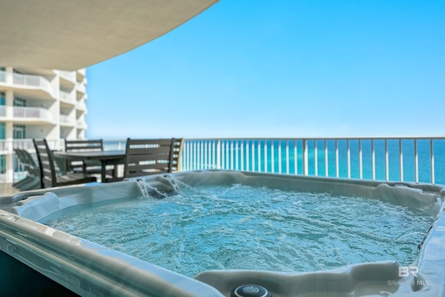 view of pool featuring a hot tub