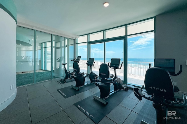 gym featuring floor to ceiling windows