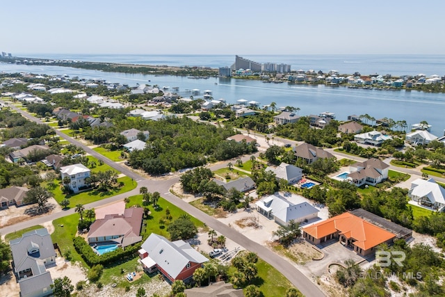 bird's eye view with a water view