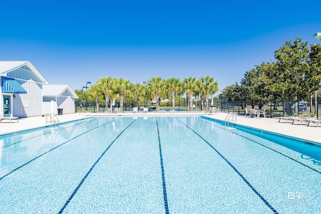 view of pool featuring a patio area