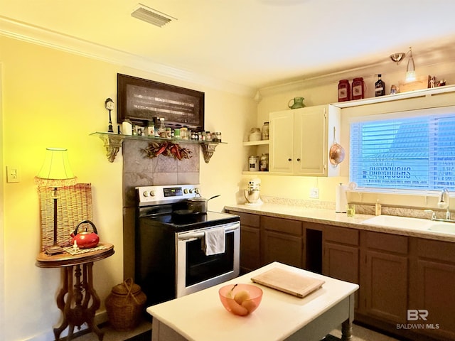 kitchen with visible vents, open shelves, ornamental molding, stainless steel range with electric cooktop, and a sink