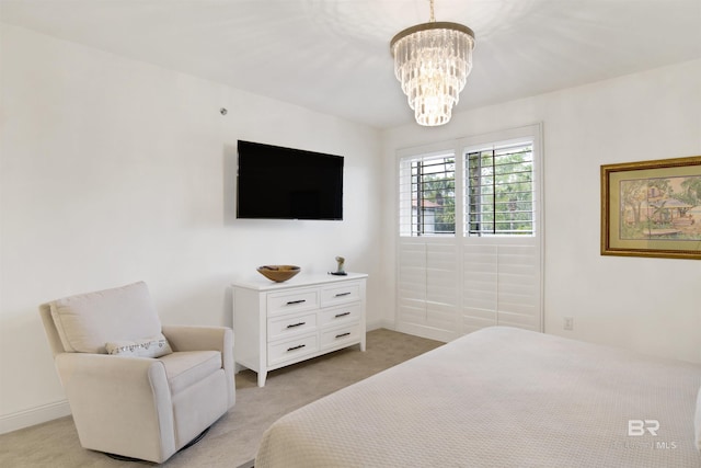 bedroom with baseboards, light carpet, and an inviting chandelier