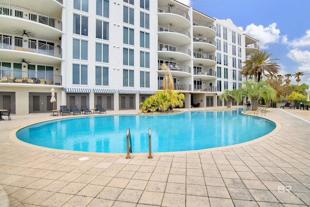 community pool with a patio