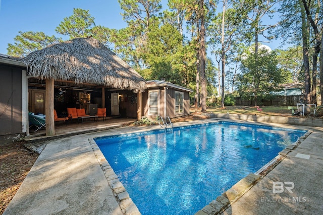 view of swimming pool featuring a patio