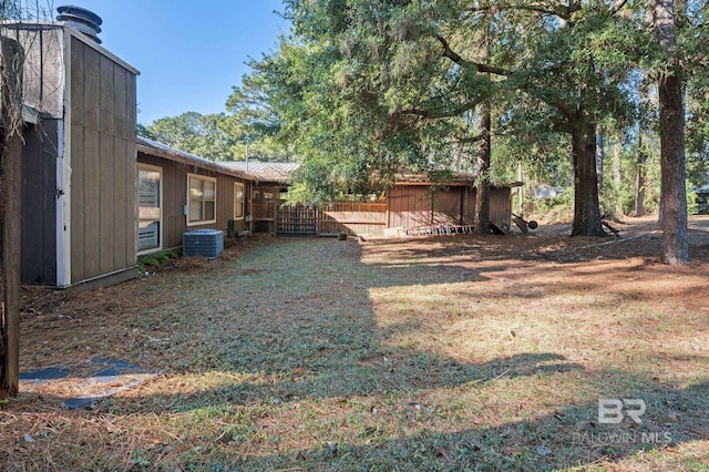 view of yard with central AC