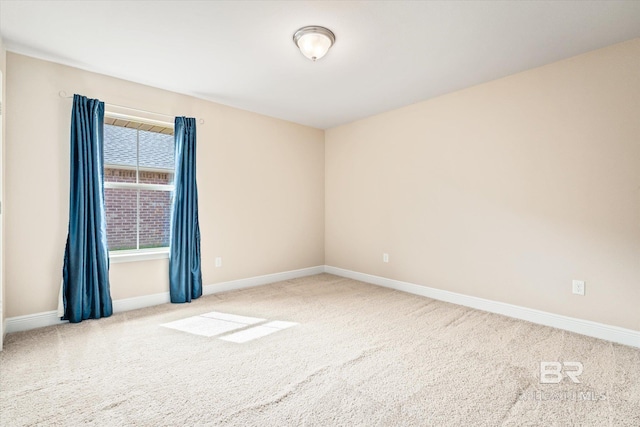 view of carpeted spare room