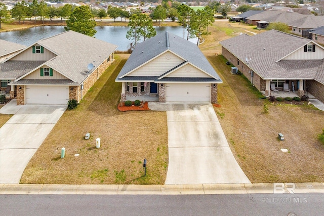 bird's eye view with a water view