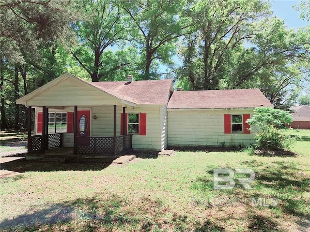 single story home with a front yard and a porch