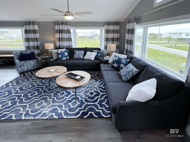 living area featuring vaulted ceiling