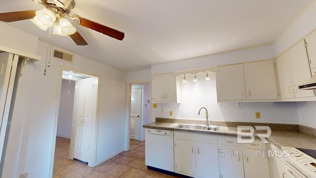 kitchen featuring white cabinetry, light tile patterned flooring, white appliances, ceiling fan, and sink